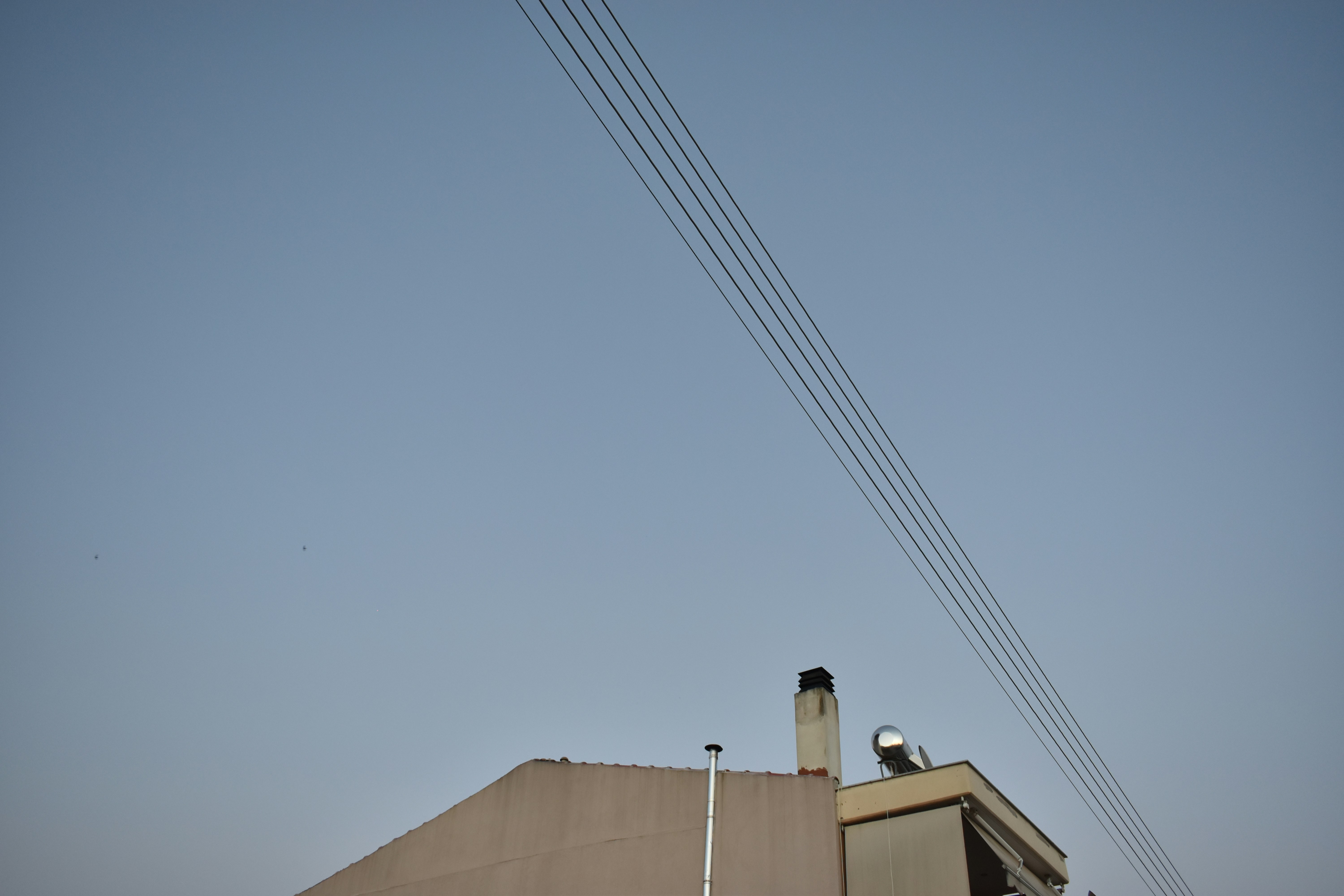 a tall building with a clock on the top of it