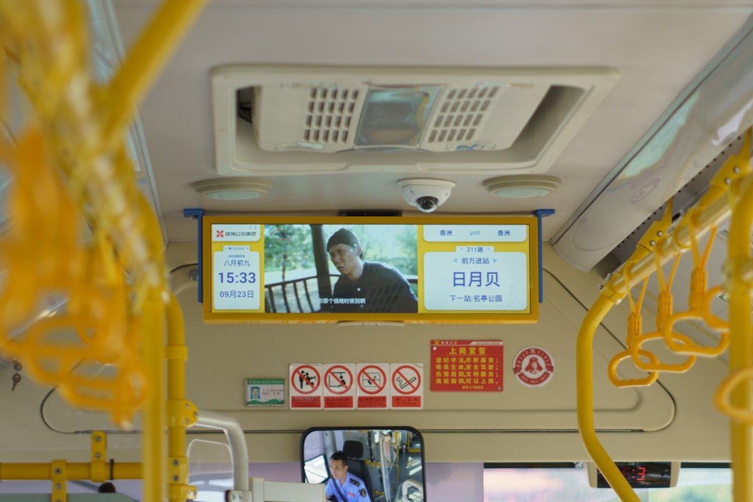 a bus with a screen on the front of it,