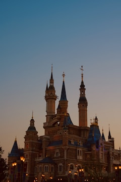 A sprawling Minecraft castle glowing under a mystical sunset.