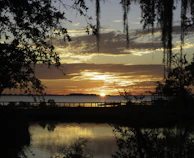 A peaceful sunset over a Georgia landscape symbolizing hope and dignity in life's final chapter.