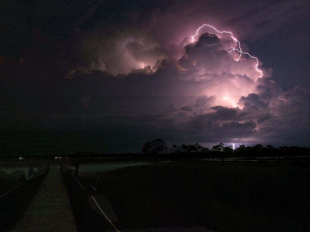 a large cloud filled with lots of lightning