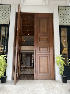A stylish levitex lift door opening to reveal a spacious, softly lit interior with premium finishes.