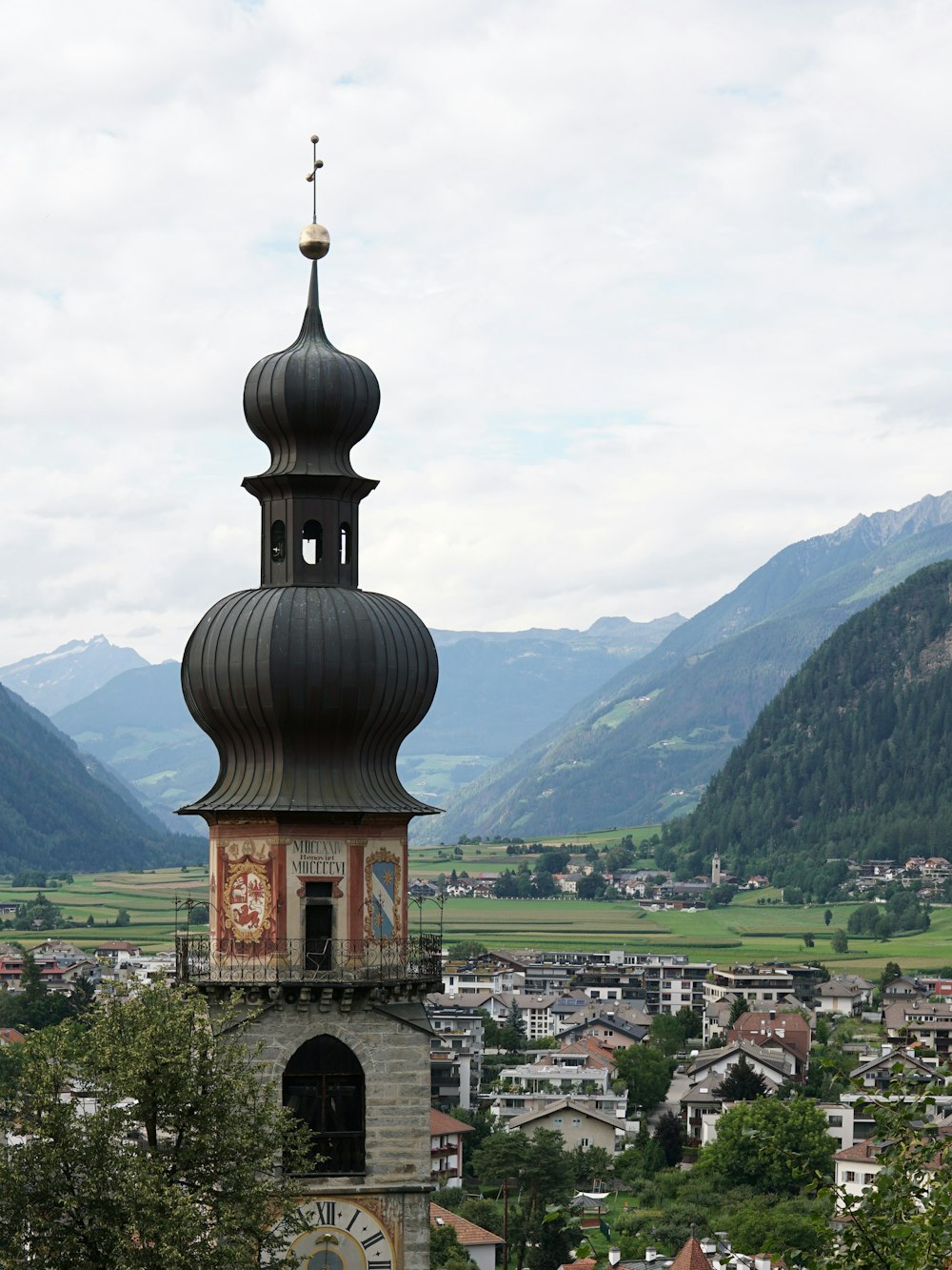 a tall tower with a clock on top of it