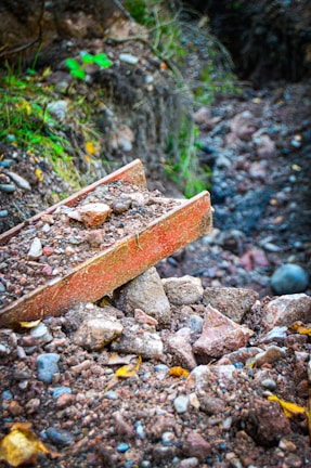 Detailed view of fractured rock pieces after controlled demolition.