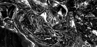 Macro shot of a textured metallic surface with intricate tech patterns glowing faintly.