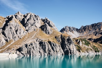 A serene landscape of Patagonia with mountains and lakes.