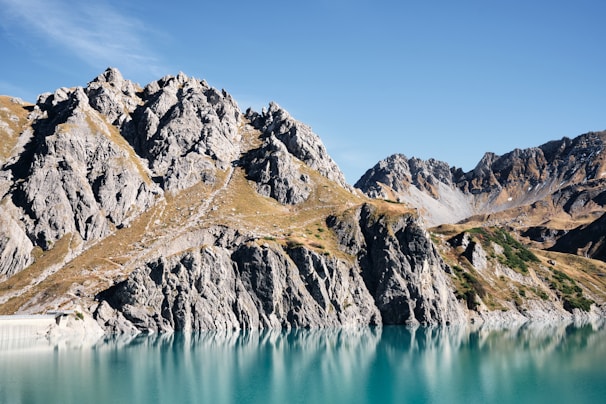 A serene landscape of Patagonia with mountains and lakes.