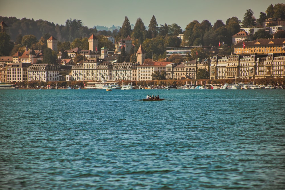 a small boat in a large body of water