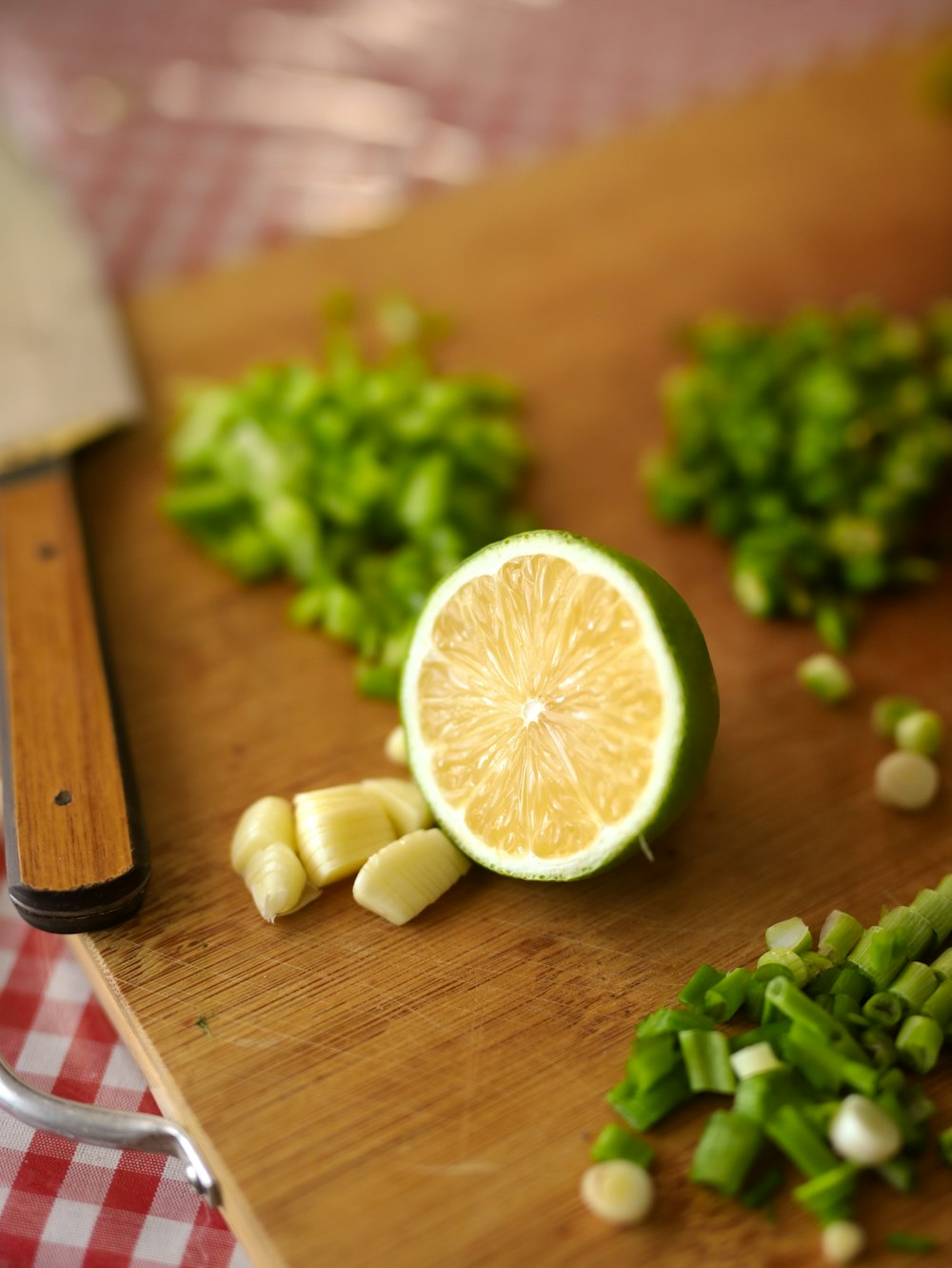 a wooden cutting board topped with sliced up lemons