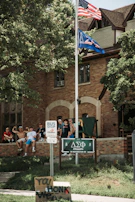 A team of fraternity members volunteering together at a local community service project.