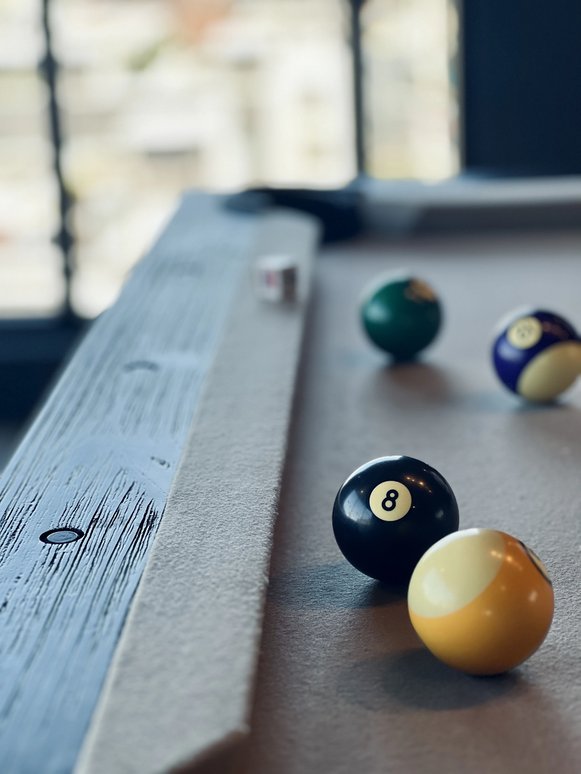 a pool table with pool balls on it
