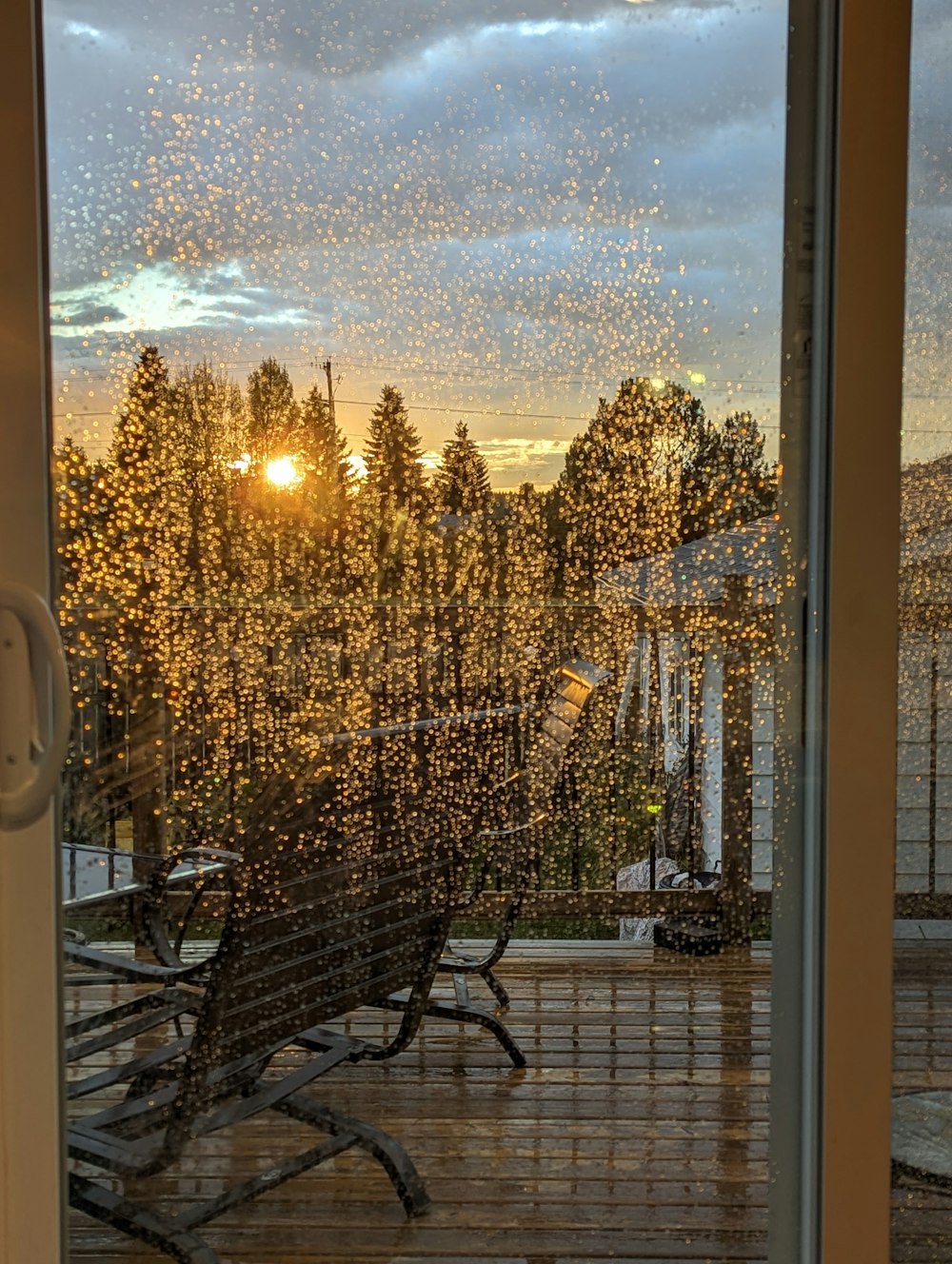 the sun is shining through the window of a house