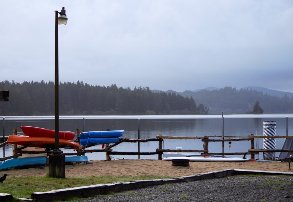 a dock with a row of canoes on it