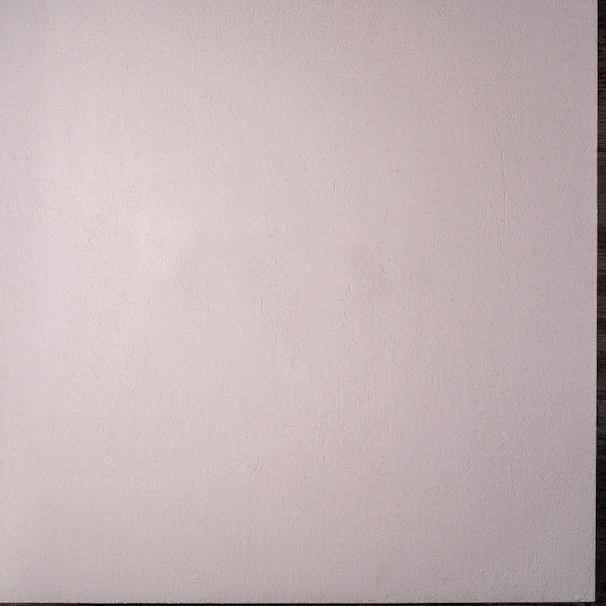 Close-up of the infinite cyclorama wall with smooth curves and bright white surface