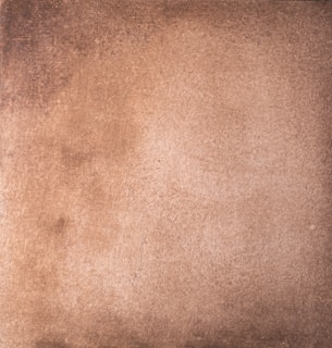 a brown background with a black border