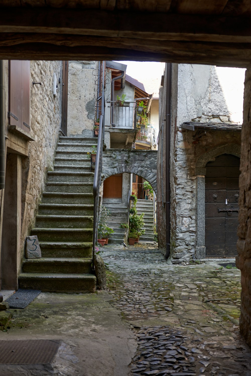 a stone building with stairs leading up to it