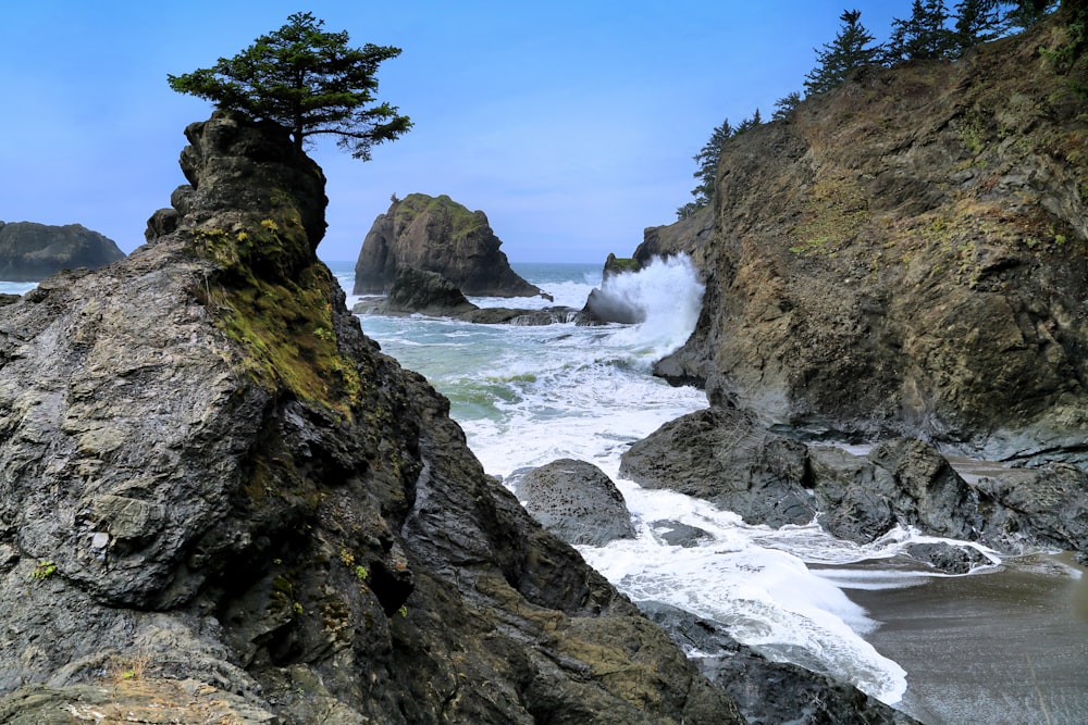 a view of the ocean from a rocky cliff