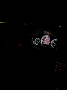 Interior car dashboard illuminated by bright, crisp Plaser LED lights with no warning lights on the panel.