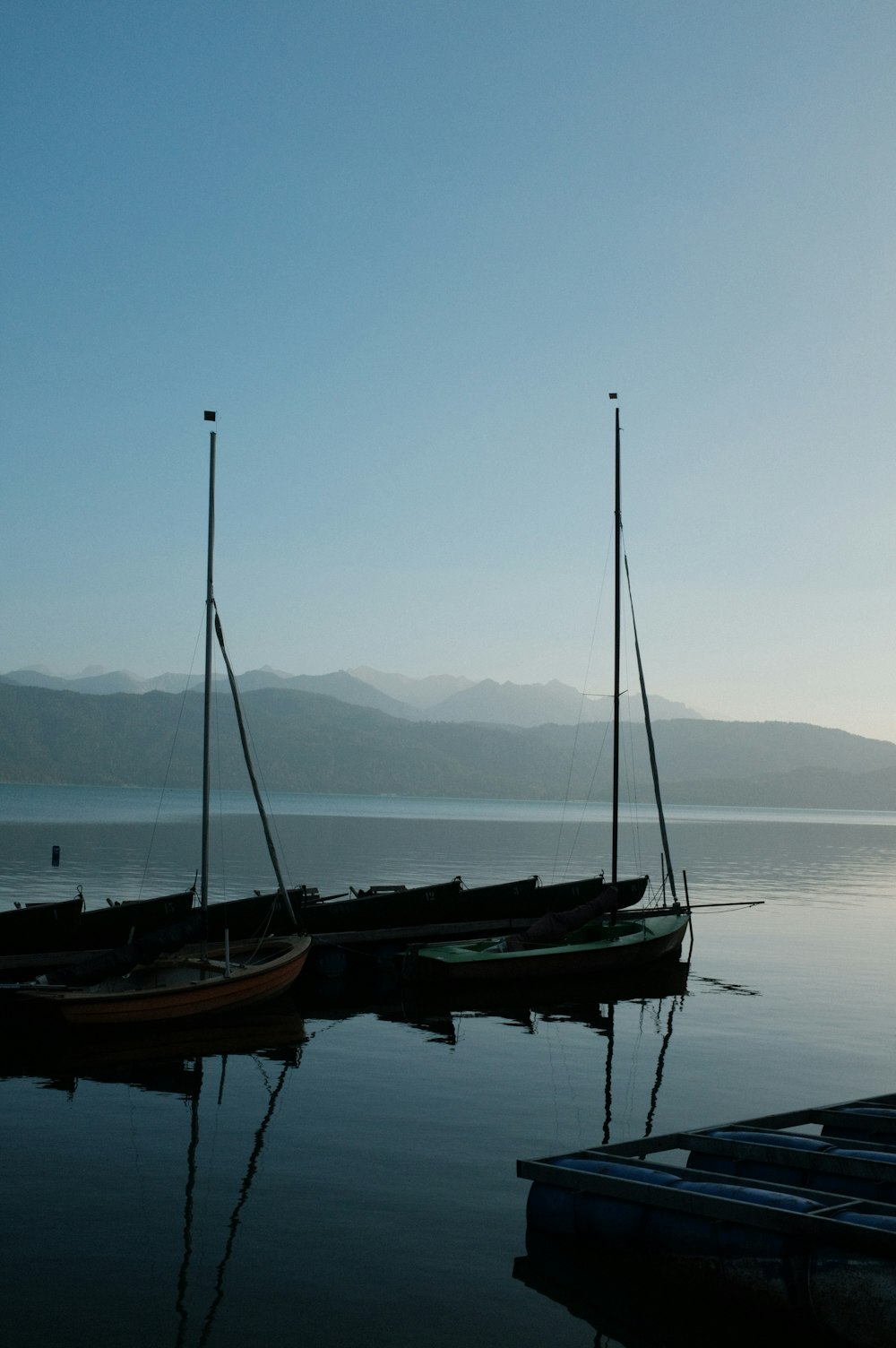 a couple of boats that are sitting in the water