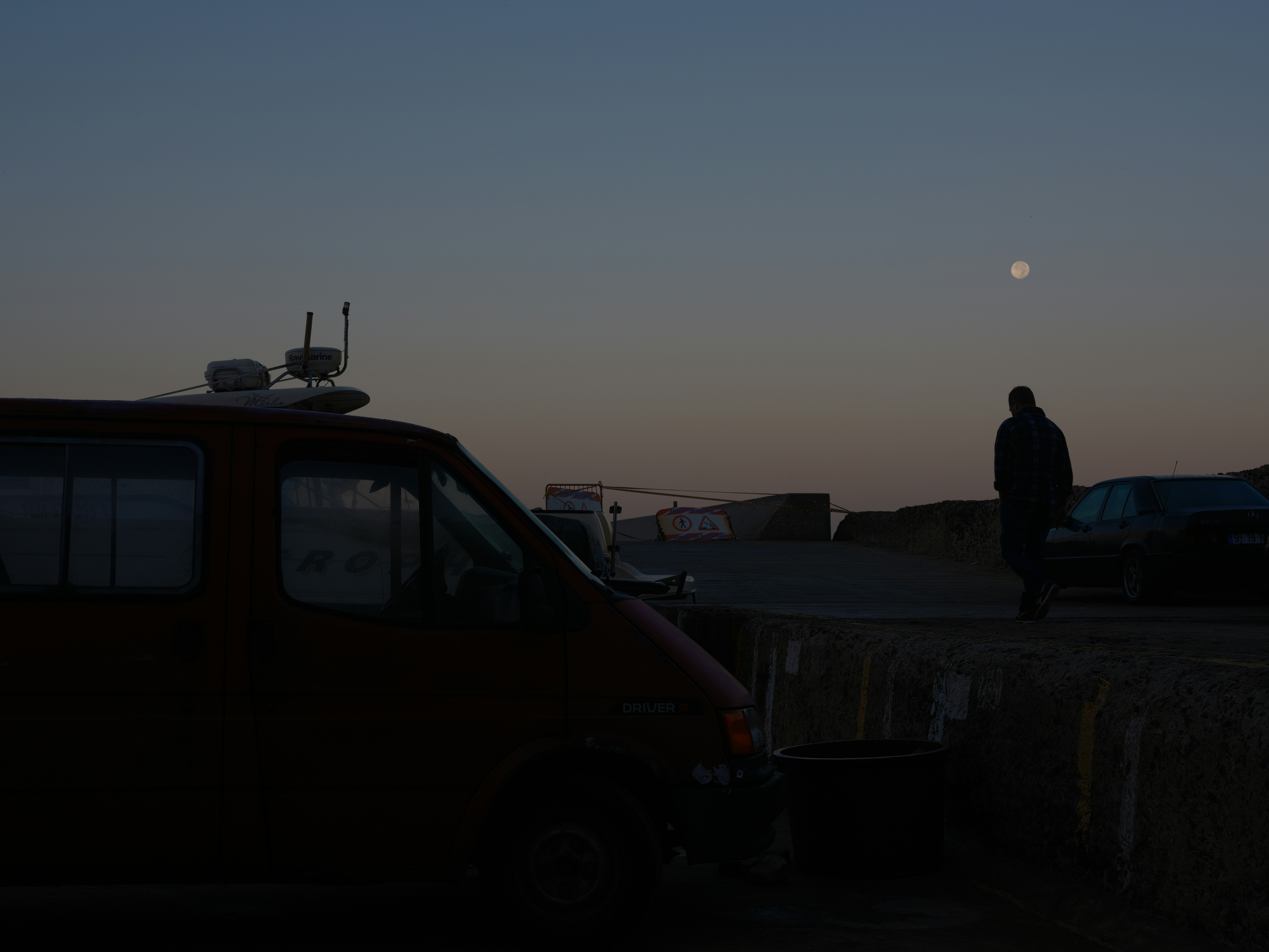 HVAC technician arriving at home at dusk - 24/7 heat pump installation langley