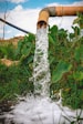 a pipe that has water coming out of it