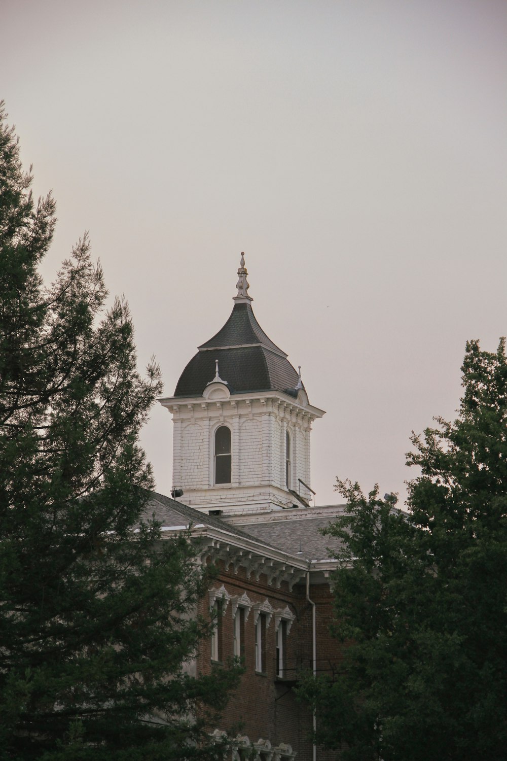 a building with a clock on the top of it