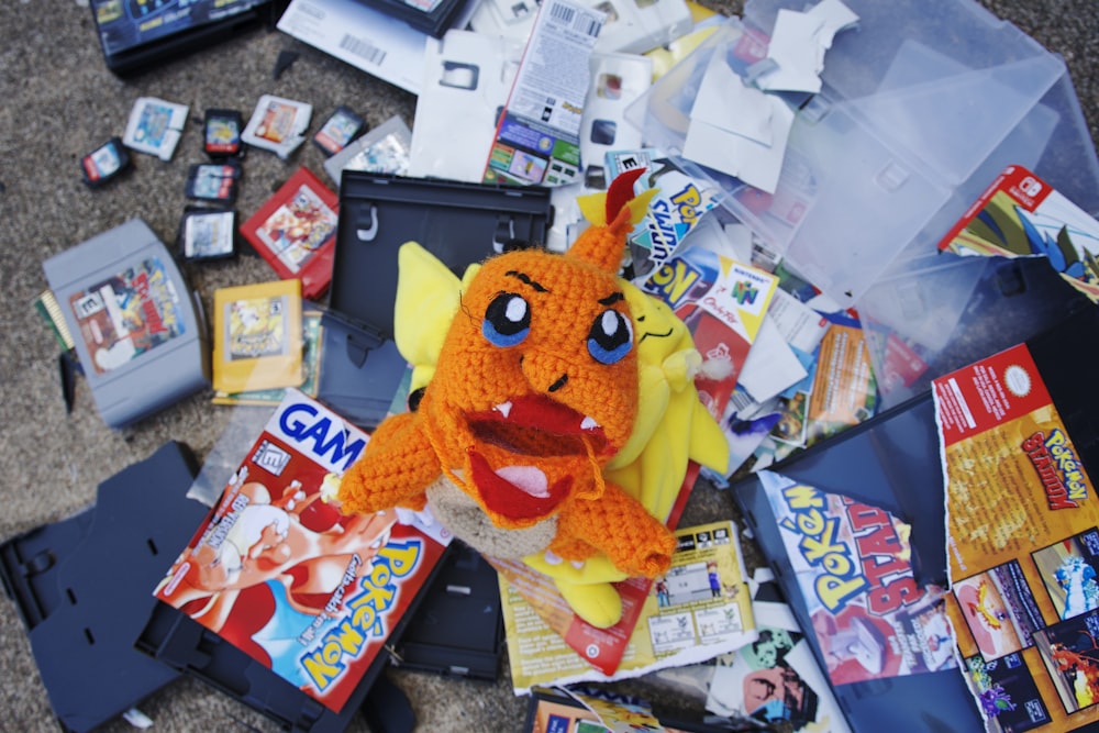 a pile of toys and other items on the ground