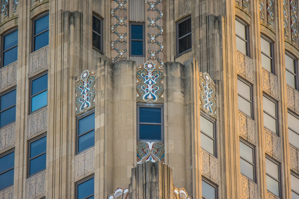 a very tall building with a clock on it's side