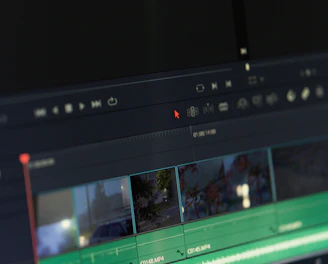 A dark-themed video editing timeline glowing with vibrant color grading effects.