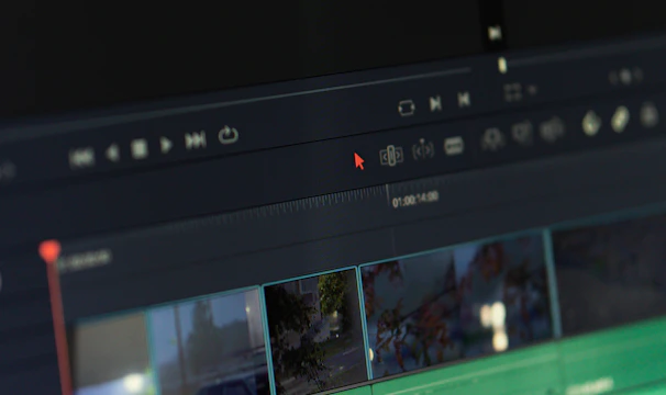 A dark-themed video editing timeline glowing with vibrant color grading effects.