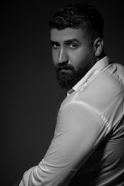 A before-and-after image showing a portrait with the background removed and replaced by a clean white backdrop.