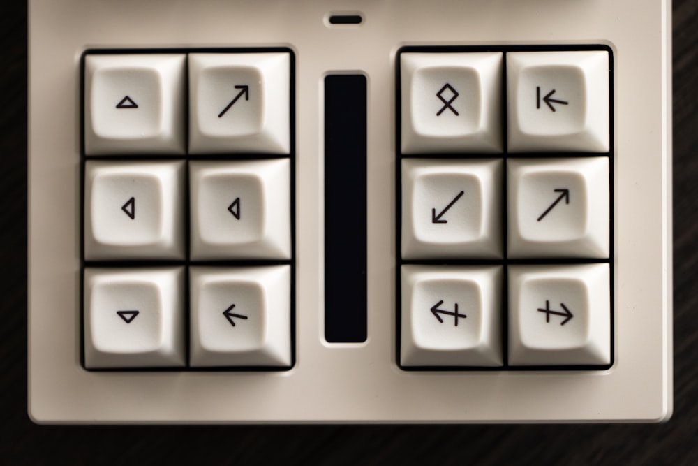 a close up of a white and black keyboard