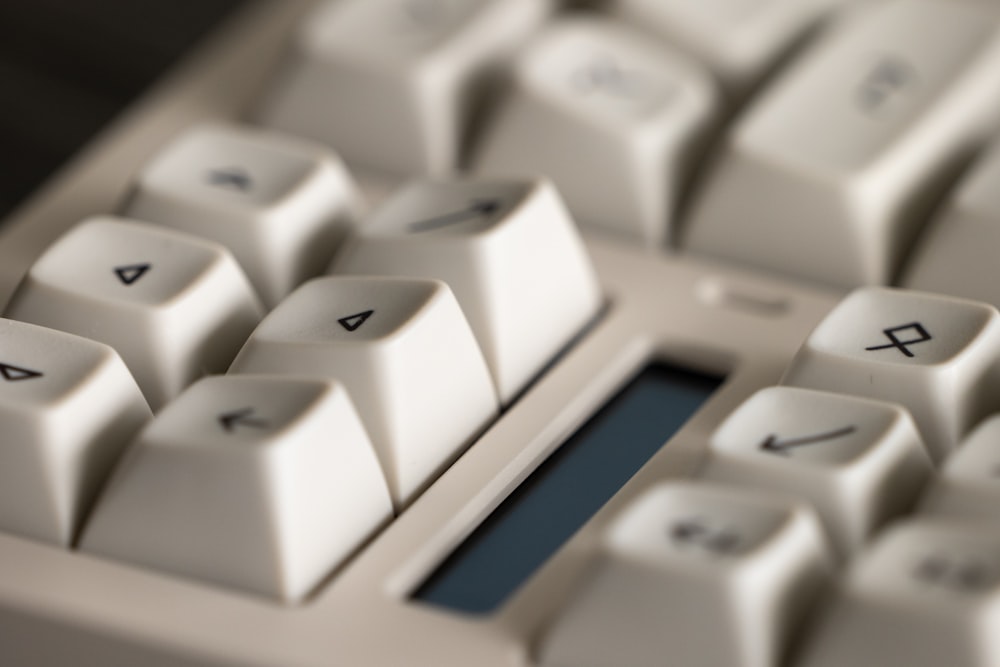 a close up of a computer keyboard with the keys missing