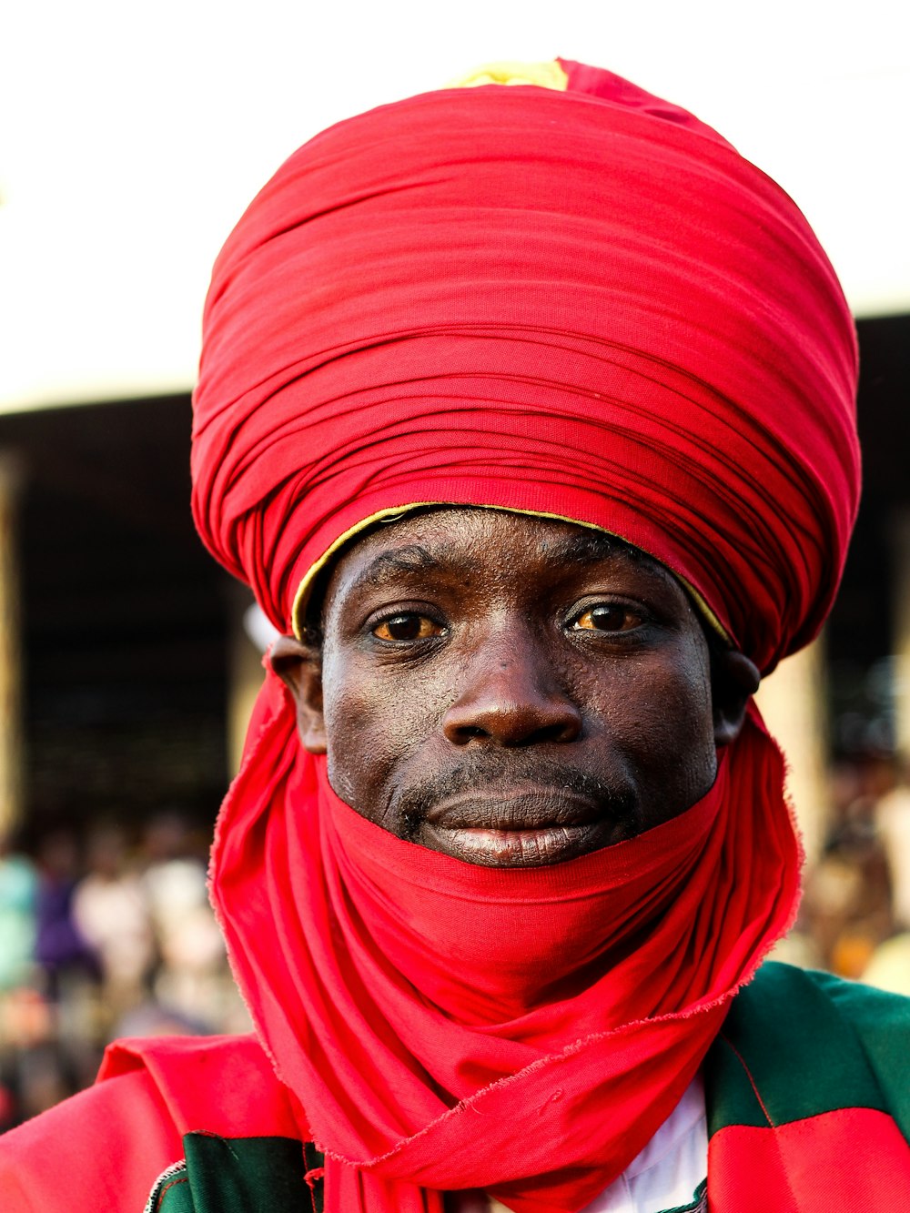 a man with a red turban on his head