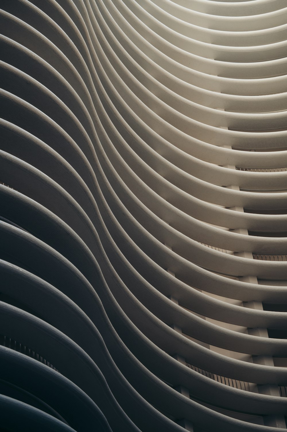 a large stack of white plates stacked on top of each other