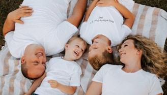 a group of people laying on top of each other