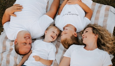 a group of people laying on top of each other