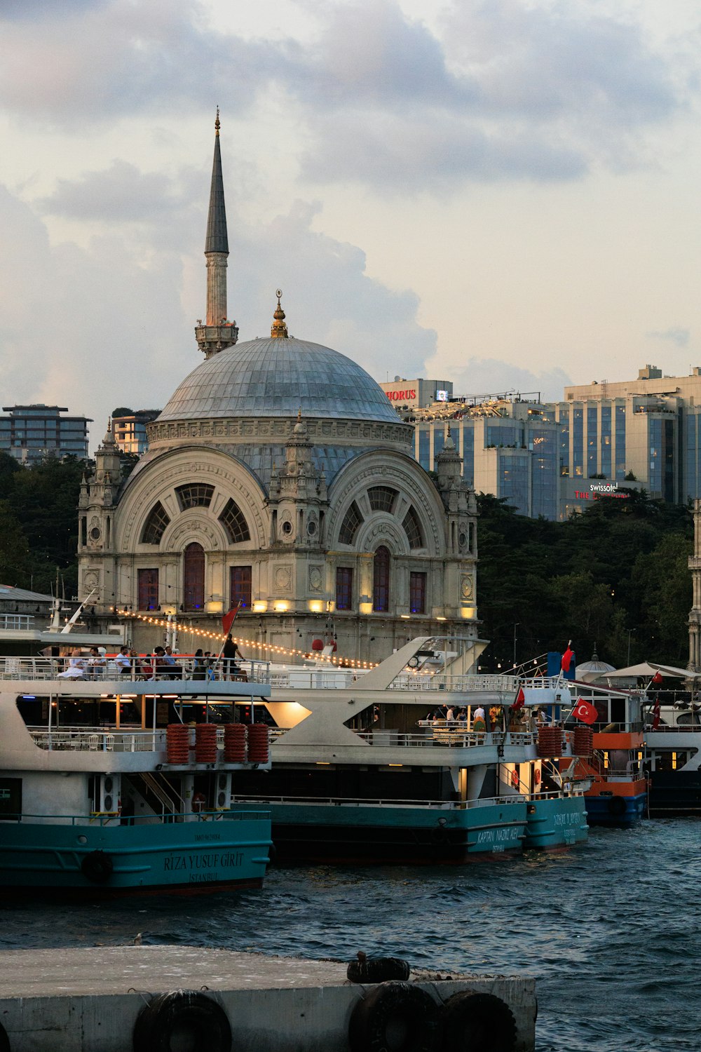 a group of boats that are sitting in the water