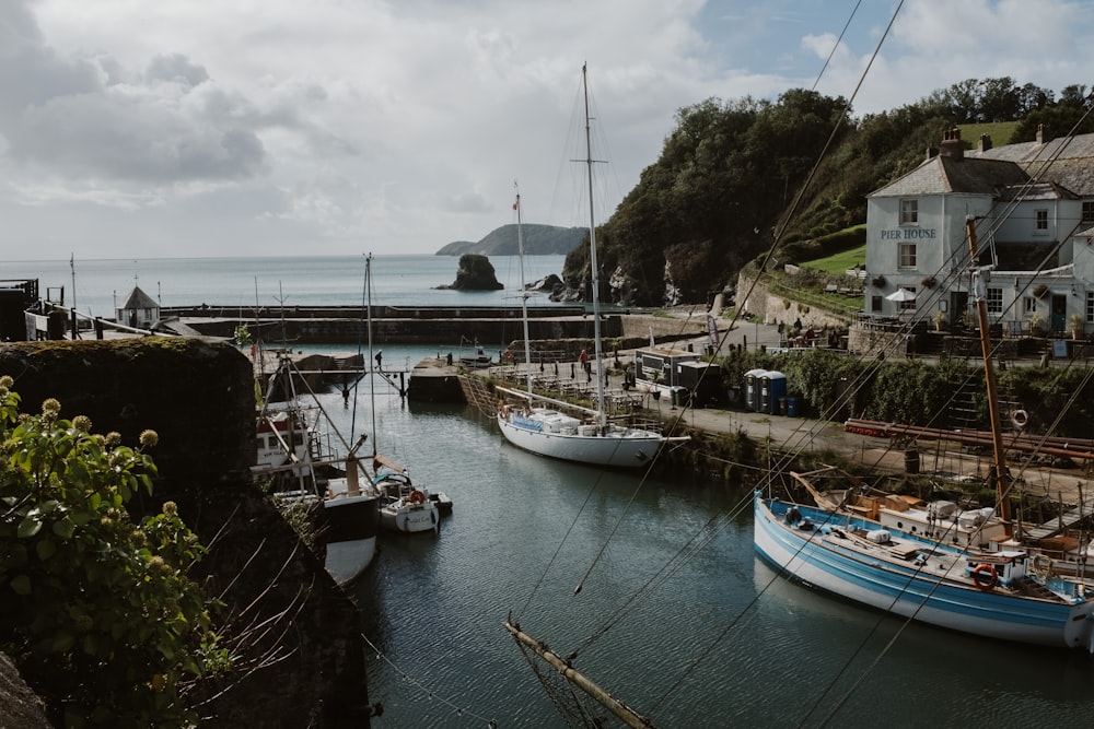 a group of boats that are sitting in the water