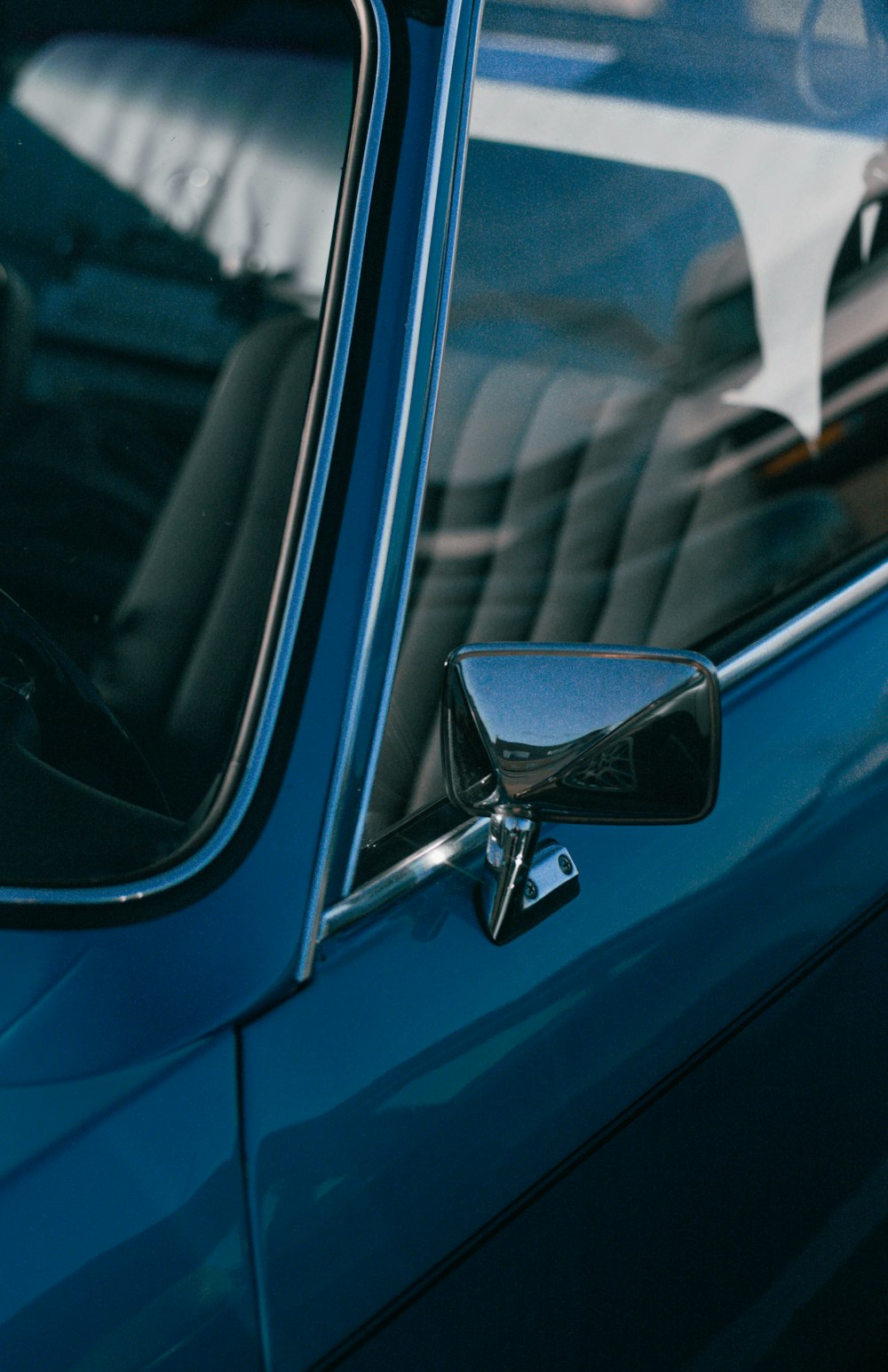 a close up of a car's side view mirror