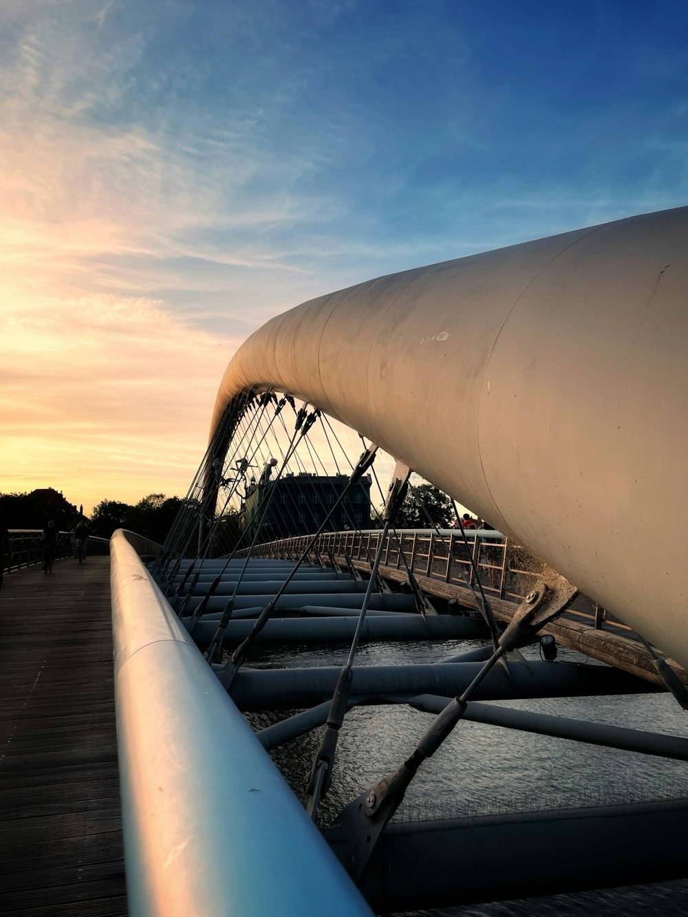 a view of a bridge over a body of water