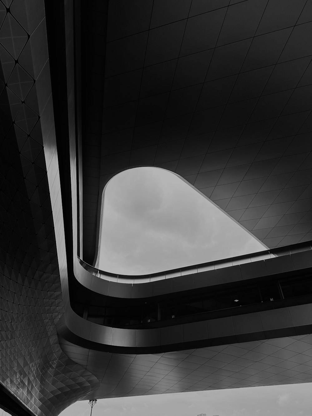 a black and white photo of a bridge