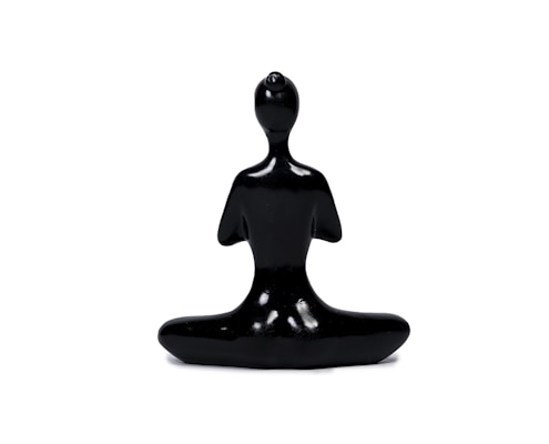 A handcrafted figurine with smooth curves and a glossy finish, capturing a unique pose.