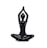 A shiny black sculpture of a human figure in a seated yoga pose, with legs crossed and arms raised above the head, creating a graceful and abstract representation of meditation or tranquility.