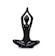 A shiny black sculpture of a human figure in a seated yoga pose, with legs crossed and arms raised above the head, creating a graceful and abstract representation of meditation or tranquility.