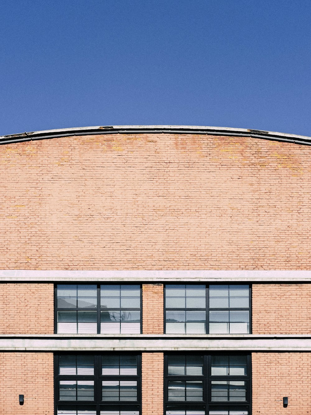 a large building with a clock on the side of it