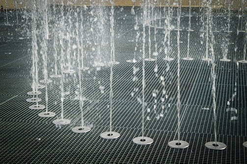 Waterjet cutting intricate patterns into stone slabs.