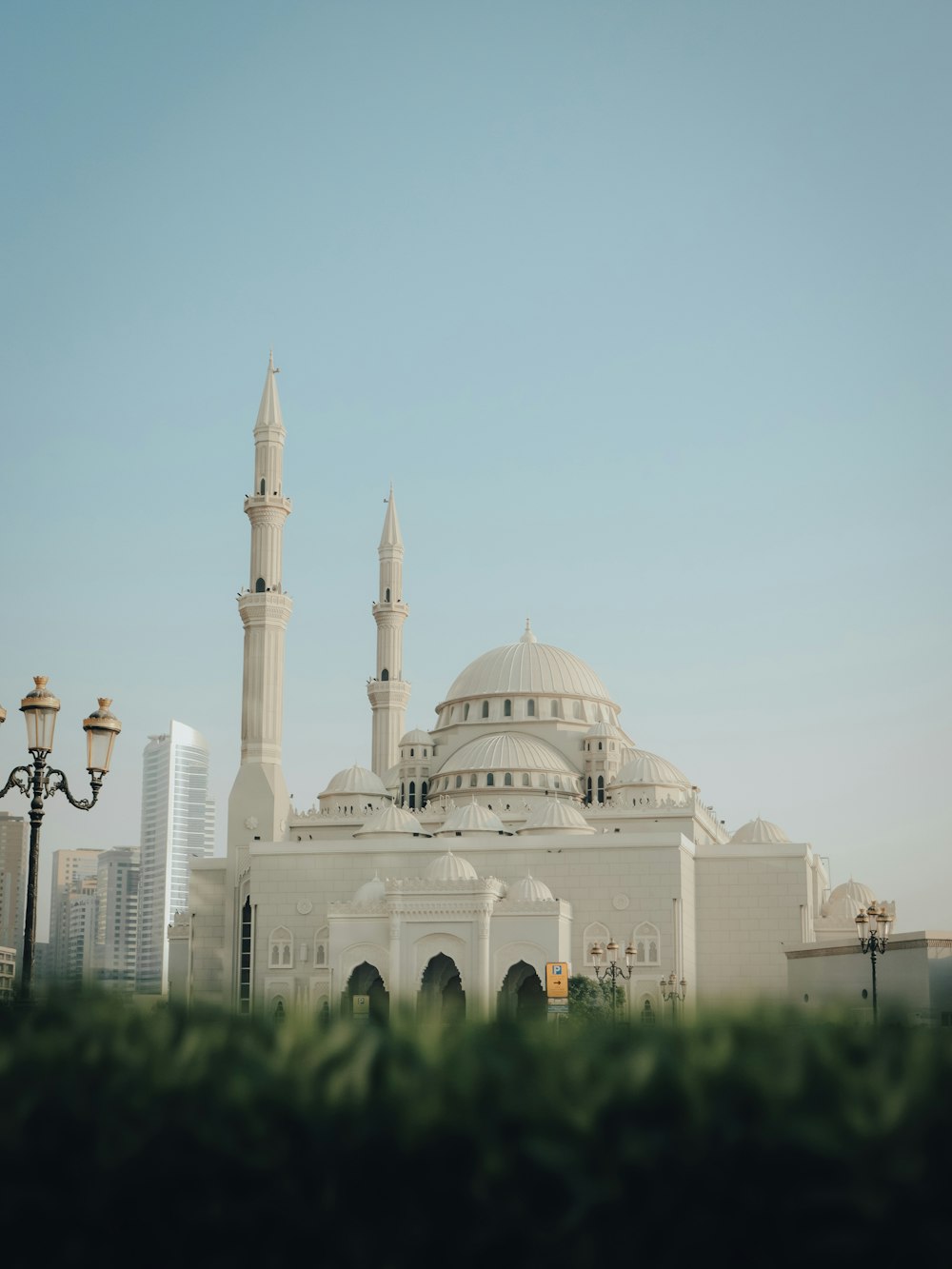 a large white building with a tall white tower