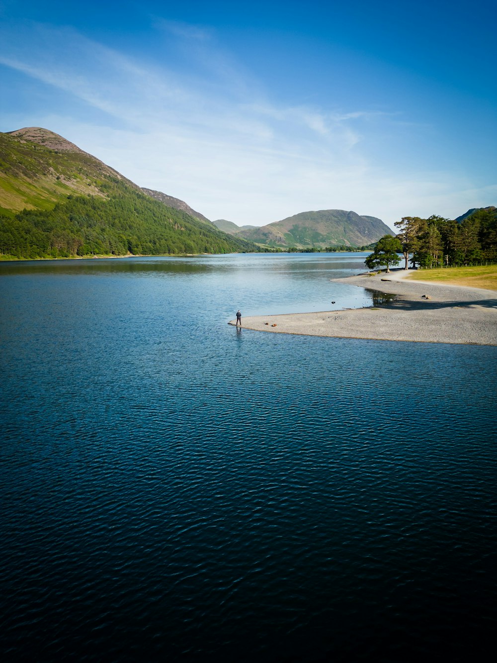 a person standing in the middle of a body of water