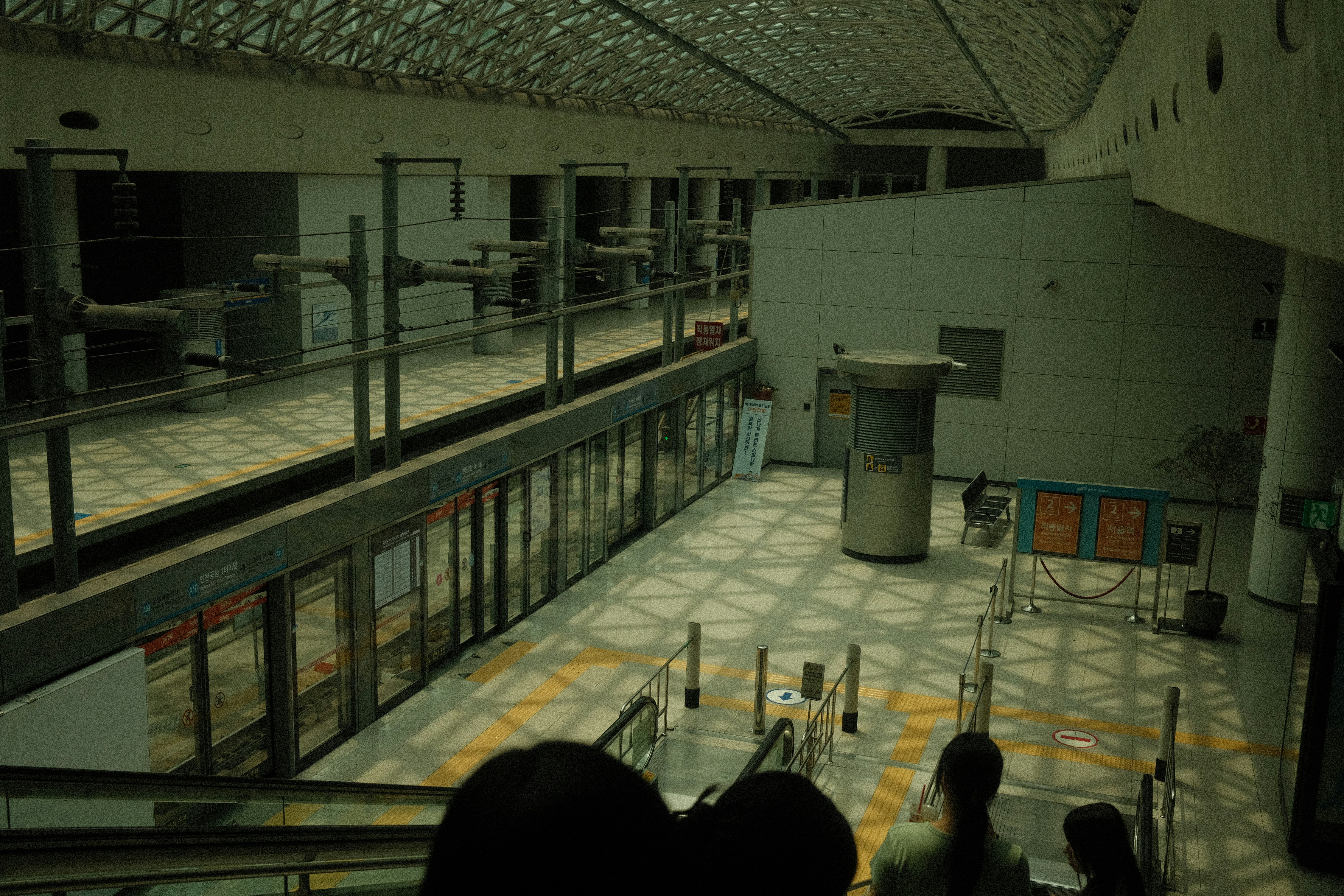 a group of people standing around a building